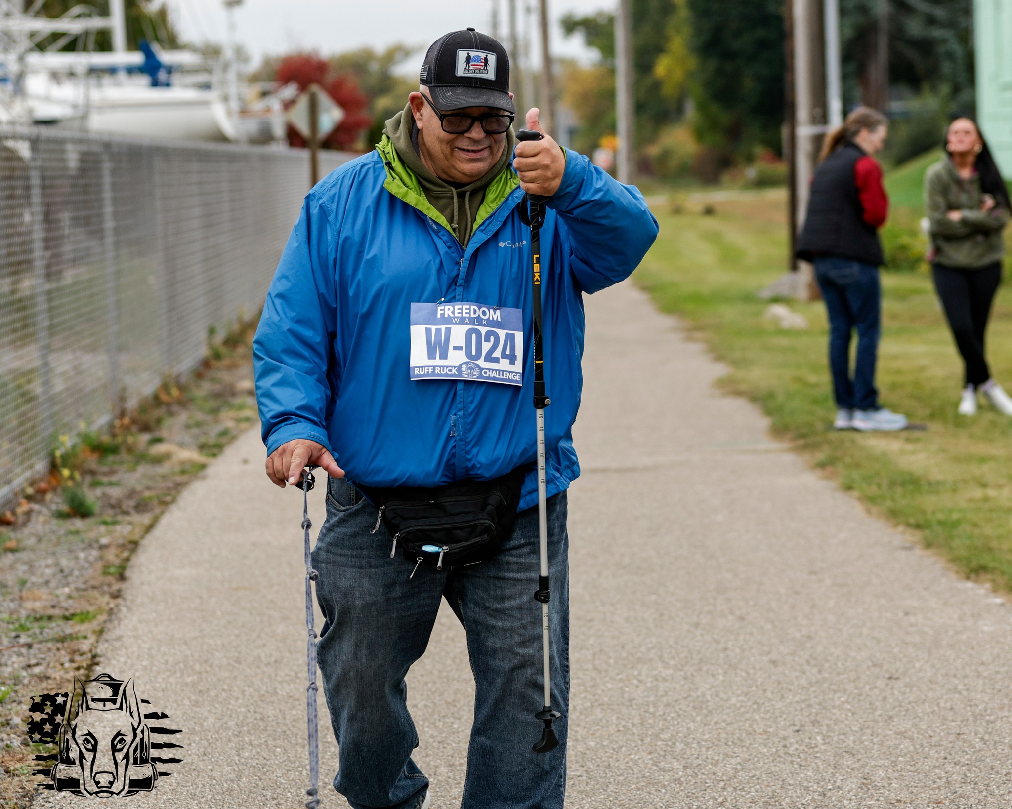 A Freedom Walk participant with trekking poles